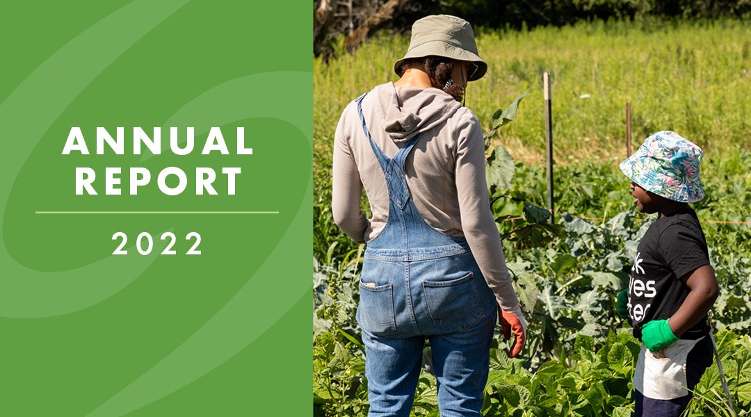 Left half says Annual Report 2022 text on a green background and right half has woman and child in a garden